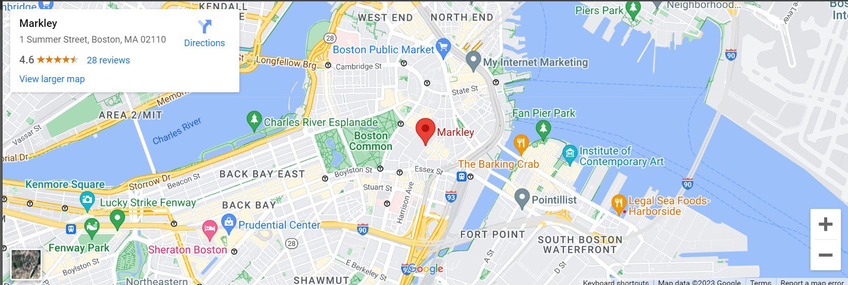 A map of the boston area with a red pin on it.